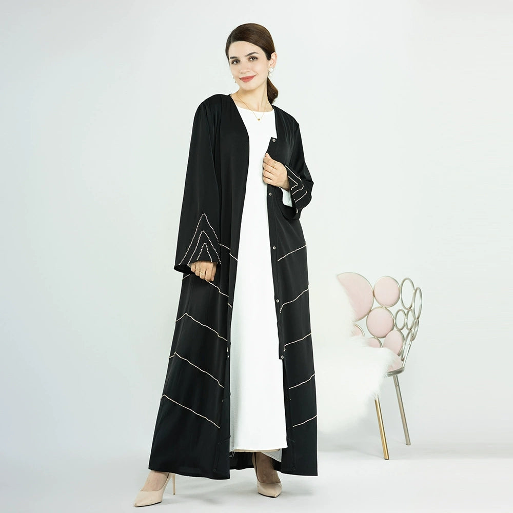 Elham Abaya mit Strasssteinen